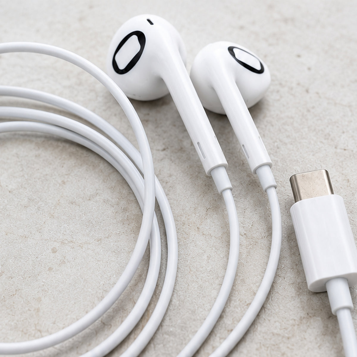 Auriculares con cable USB-C Donde Sonaban, sobre piedra ostionera