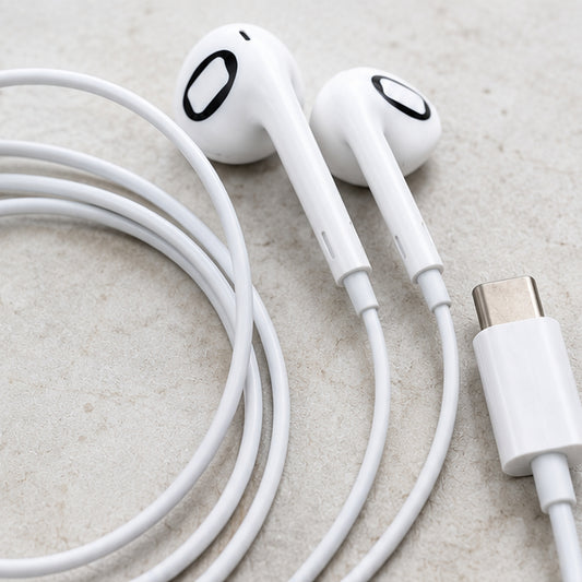 Auriculares con cable USB-C Donde Sonaban, sobre piedra ostionera