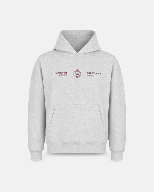 Hoodie MEMORIES gris jaspeado de Oyster Stone, vista delantera con estampación Gades Vibes, escudo Memories Dept y Summers Never Really End